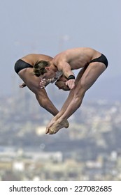 BARCELONA, SPAIN-SEPTEMBER 05,1999: Australian Divers Helm And Newbery During The Synchronized Diving Final Of The Swimming World Cup, In Barcelona.         