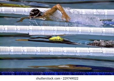 BARCELONA, SPAIN-SEPTEMBER 07, 1999: male professional swimmers competing during the 200 meters free style final of the Swimming World Championship, in Barcelona.