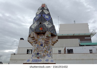 Barcelona,Spain-October,23.2019: The Mosaic Chimneys Made Of Broken Ceramic Tiles On Roof Of Palau Güell , One Of The Earlest Gaudi's Masterpieces