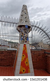 Barcelona,Spain-October,23.2019: The Mosaic Chimneys Made Of Broken Ceramic Tiles On Roof Of Palau Güell , One Of The Earlest Gaudi's Masterpieces