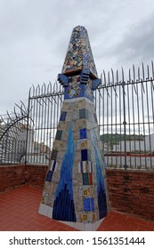 Barcelona,Spain-October,23.2019: The Mosaic Chimneys Made Of Broken Ceramic Tiles On Roof Of Palau Güell , One Of The Earlest Gaudi's Masterpieces