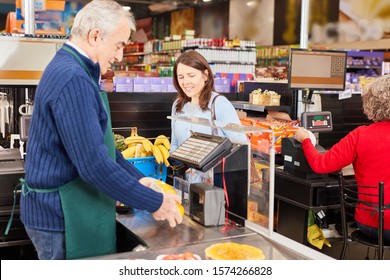 Barcode Cashier Scanning The Goods At The Scanner Cash Register In The Supermarket