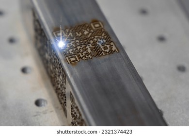 The barcode on square metal  pipe from etching machine. The laser etching machine.