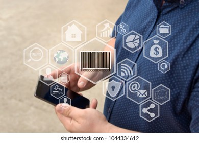 Barcode product , button on the touch screen with a blur background of the businessman with the phone.The concept of barcode product 