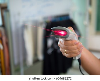 Barcode Scanner  In Woman's Hand