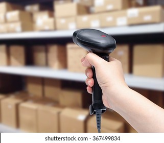 Barcode Scanner In Woman's Hand Isolated On White Background