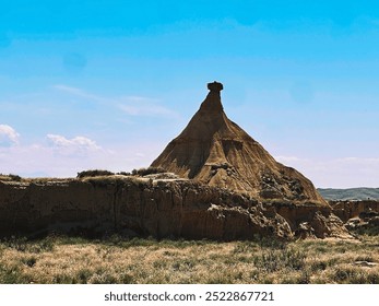 Bardenas Reales is a striking semi-desert natural region in southern Spain, known for its unique, barren landscapes, eroded rock formations, and dramatic canyons. - Powered by Shutterstock