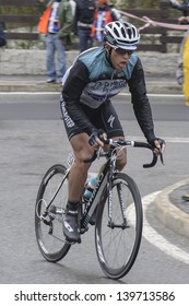 BARDONECCHIA, ITALY - MAY 18: Matteo Trentin In Griro D'Italia Race On May 18, 2013. He Chases The First Racers After The Drilling Of A Wheel.