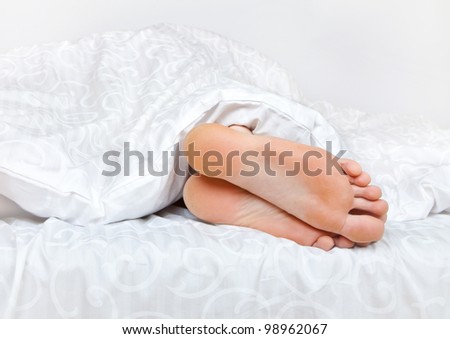 bare feet in bed