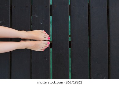 Bare Feet Girls On Wooden Bridge View From Above