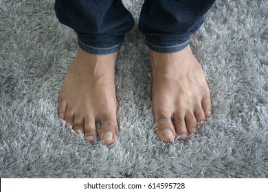 Bare Feet On Carpet