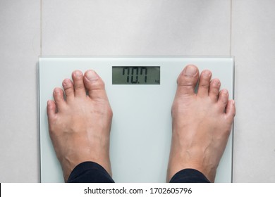 Bare Feet On Digital Body Weight Scale, Lose Weight Concept