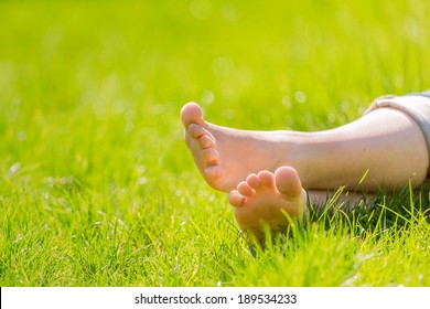 Bare Feet On Green Grass, Copy Space 