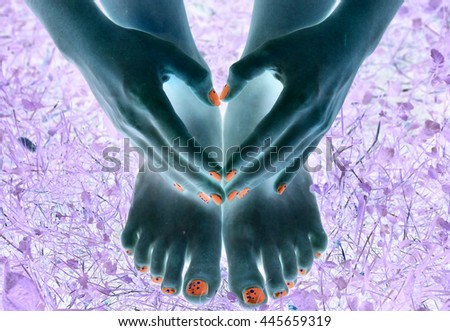 bare foot and hands make finger heart with manicure and pedicure fantasy effect close up photo
