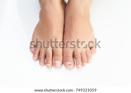 Bare male foot on white background 