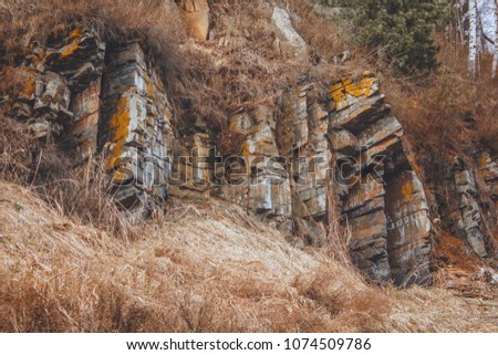 Bare stone mountain in spring