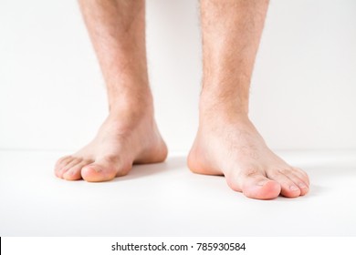 Barefoot. Cares about a man's clean and soft foot skin. Body care concept.