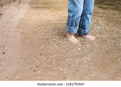 Barefoot Child In Water Jeans