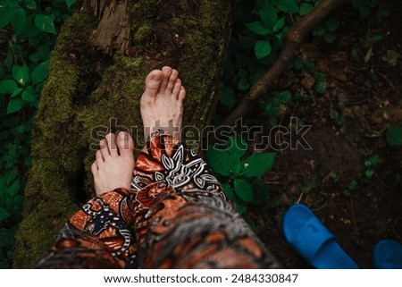 Similar – Feet of a woman wearing sandals