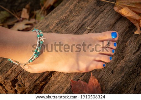 Barefoot girl in Autumn boho style