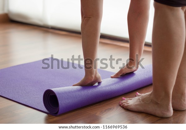 Barefoot Woman Folding Purple Yoga Mat Stock Photo Edit Now