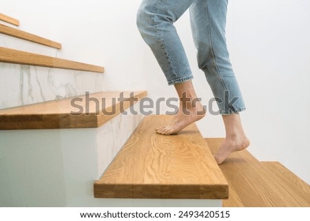 Similar – Image, Stock Photo The staircase of a long abandoned church is slowly decaying. The doorknob, however, shines like new. Everything else here is totally dirty and dusty. How mysterious!