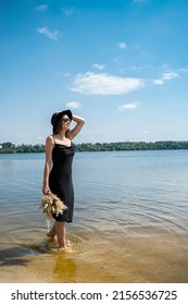 Barefoot Woman Walk In Pond In Black Dress, Summer Day, Lifestyle