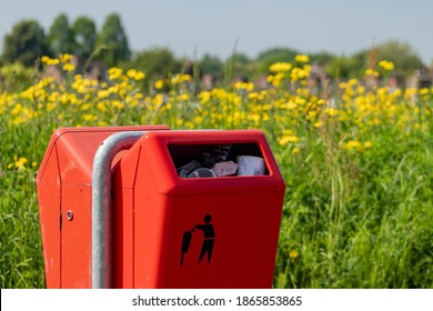 Barendrecht, Netherlands - 5-24-2019: Full Trashcan In A Park