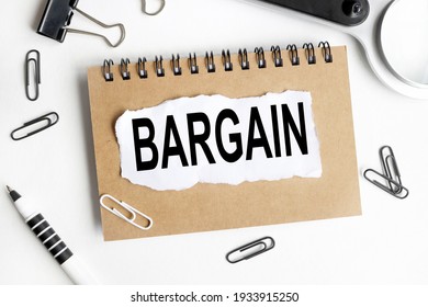 BARGAIN. Text on white notepad paper on light background - Shutterstock ID 1933915250