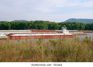 A Barge On The Upper Mississippi River On It's Way Upstream.