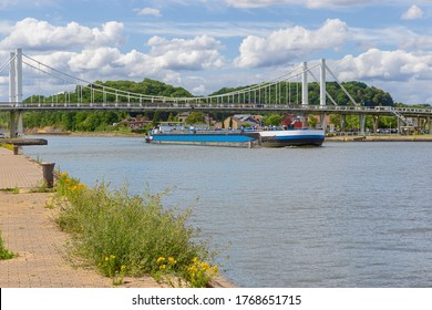 Barge Passing Under The Bridge Of Kanne On The Albert Canal