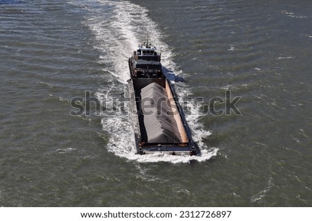 Barge Pushing Stone on East River