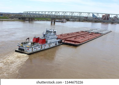 Barge And Tug Pushing Down River