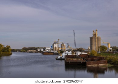 Barges at a grain loading facility along the Mississippi River.
