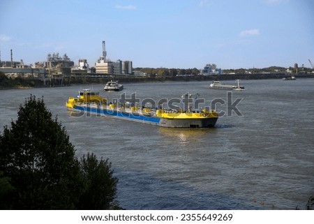 Barges on the river Rhine in Cologne Godorf