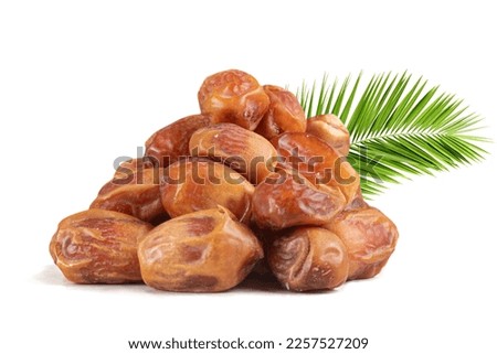 Barhi dates Barhi rot hub dates from Saudi Arabia. Pile of tasty dry dates isolated on white background. Arabic food