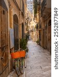 Bari Vecchia, Italy, The stone street historic old building, city transport - bike