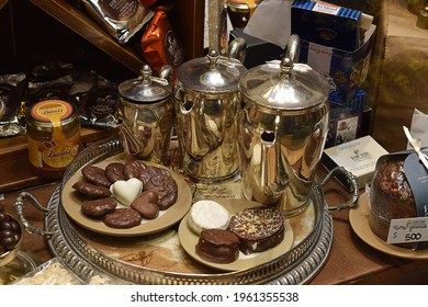 Bariloche, Argentina, 19 Of December, 2019.
Teapot And Typical Chocolate Sweets In The Region