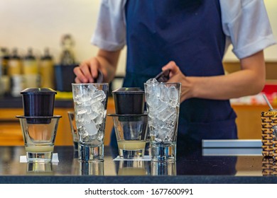 Barista Brewing Vietnamese Condensed Milk Coffee With Dripping Filter