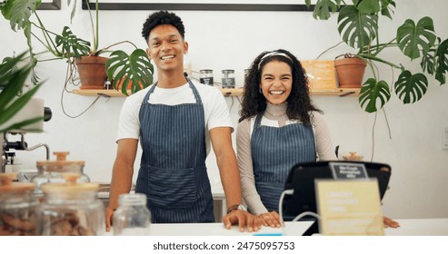 Barista, coffee shop and employees with services, shop and coworkers with smile and professional. Face, man and woman in a cafe and teamwork with cooperation and confidence with small business or joy - Powered by Shutterstock