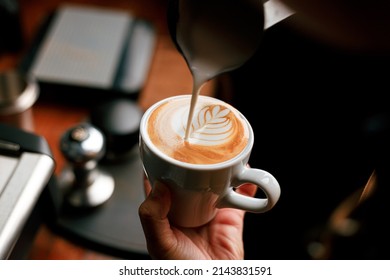 Barista Making Latte Art Coffee