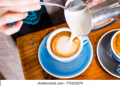 Barista Pouring Flat White Coffee