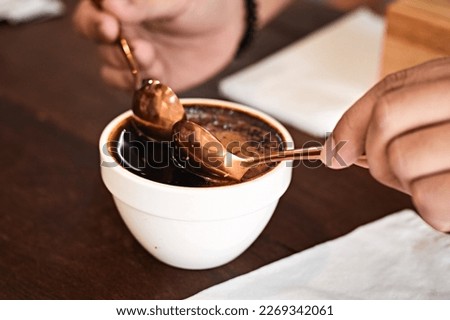 Barista preparing to test and inspecting the quality of coffee,selective focus
