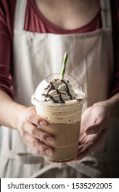 Barista Serving Coffee Frappe In Plastic Cup