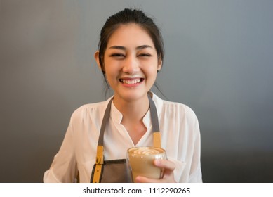 Barista Smiling Young Asian Woman Drink Coffee Making A Mess  Milk Foam On Her Mouth.Clumsy Dirty Girl Opens Mouth.