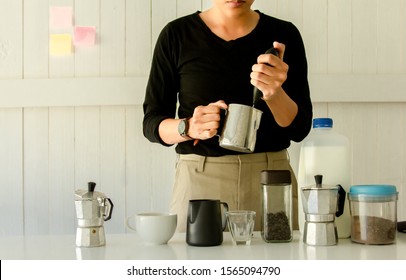 Barista Is Steaming, Milk Frother Latte Art In Coffee Mug At Home In The Morning 