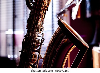 Baritone Saxophone Close-up With Window Background