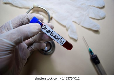 Barium Swallow Test Text On Sticky Notes. Top View Isolated On Office Desk. Healthcare/Medical Concept