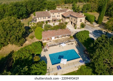 Barjac, France - July 24th 2022 : Aerial View With Drone Of A Sumptuous Stone Villa In The South Of France With A Pool 