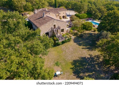 Barjac, France - July 24th 2022 : Aerial View With Drone Of A Sumptuous Stone Villa In The South Of France With A Pool